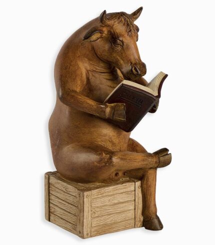 Statue vache qui broute